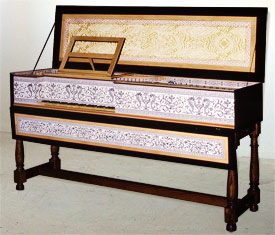The spinet virginal has its keyboard on the left